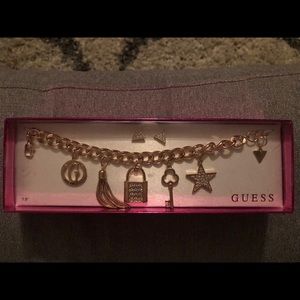 Guess bracelet and earrings set